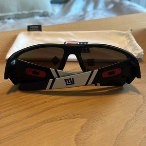 Oakley Men’s Sunglasses NY Giants.  Bought directly from NFL never worn. NWT&box